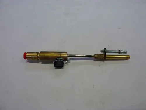 Bronzefarbener Düsenstock mit rotem Knopf und einstellbarem Ventil, geeignet für Anwendungen mit Remeha-Geräten.